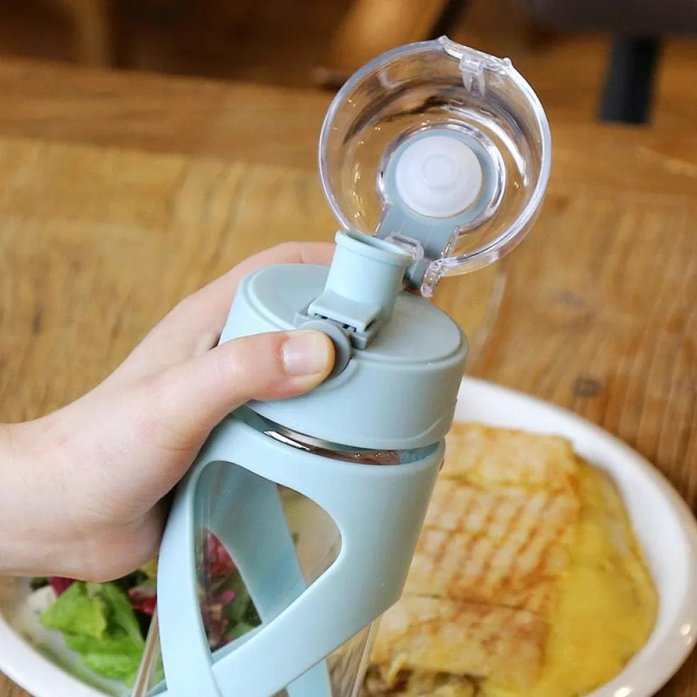 Bouteille d'eau en verre avec manchon en silicone antidérapant, anti-fuite, sans BPA, respectueux de l'environnement pour boissons chaudes et froides, idéale pour l'école, la maison, le bureau, les